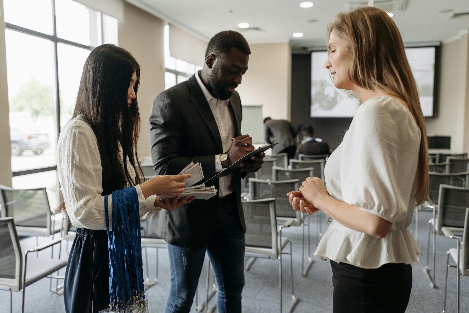 Business professionals discussing event needs